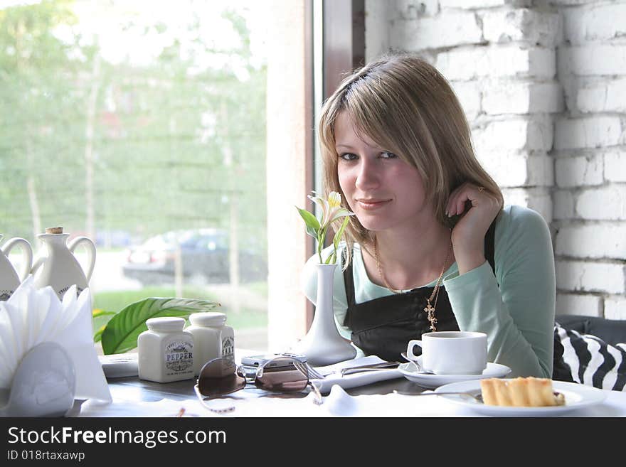 The young girl in cafe. The young girl in cafe