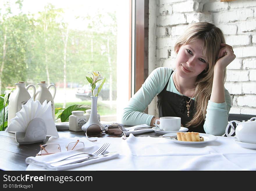 The young girl in cafe. The young girl in cafe