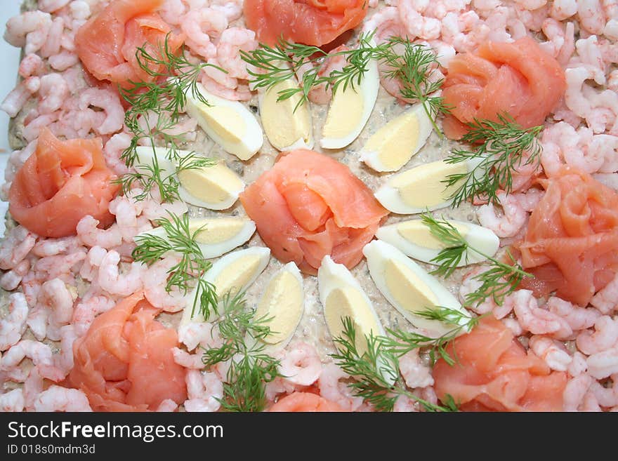 Delicious seafood gateau with smoked salmon,shrimps,tuna,egg and dill. Delicious seafood gateau with smoked salmon,shrimps,tuna,egg and dill