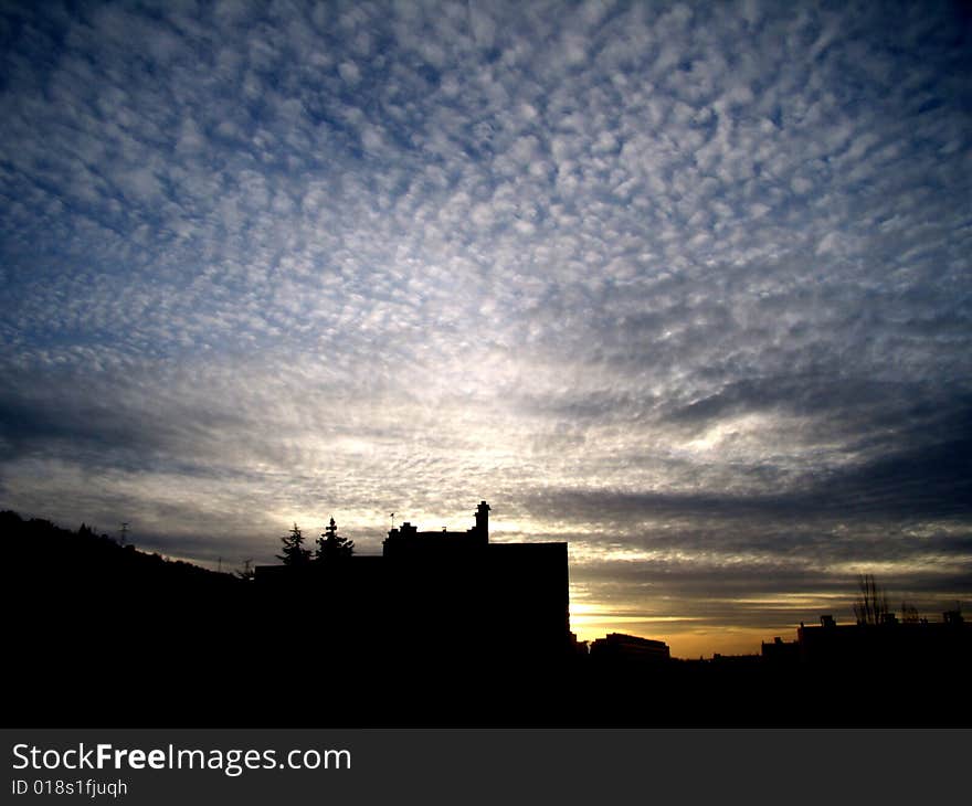 Beautiful cloudy sky and sunset over Saint Etienne in France. Beautiful cloudy sky and sunset over Saint Etienne in France