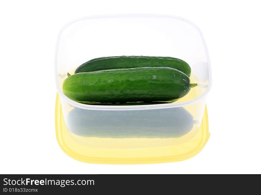 Lunch box with cucumbers.