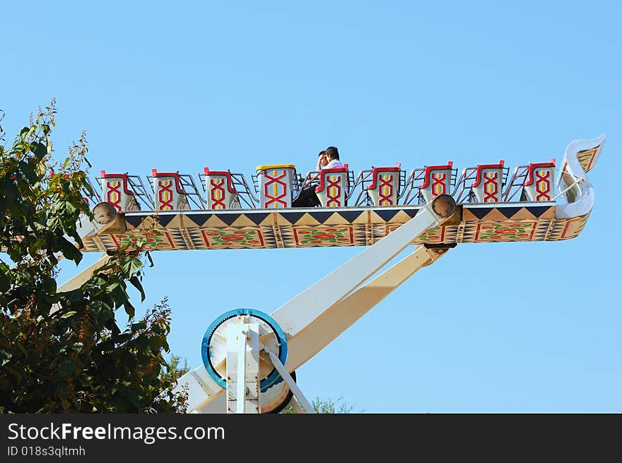 Pleasure ground ship in blue sky