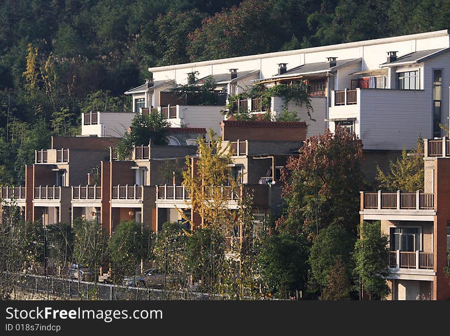 Shot of bright  house near dark forest