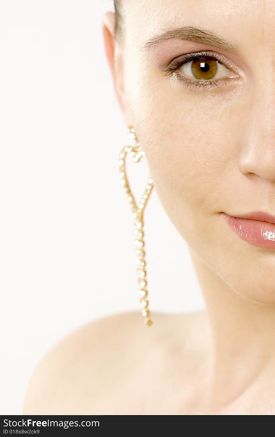 Portrait of a pretty, young woman on a white background. Portrait of a pretty, young woman on a white background.