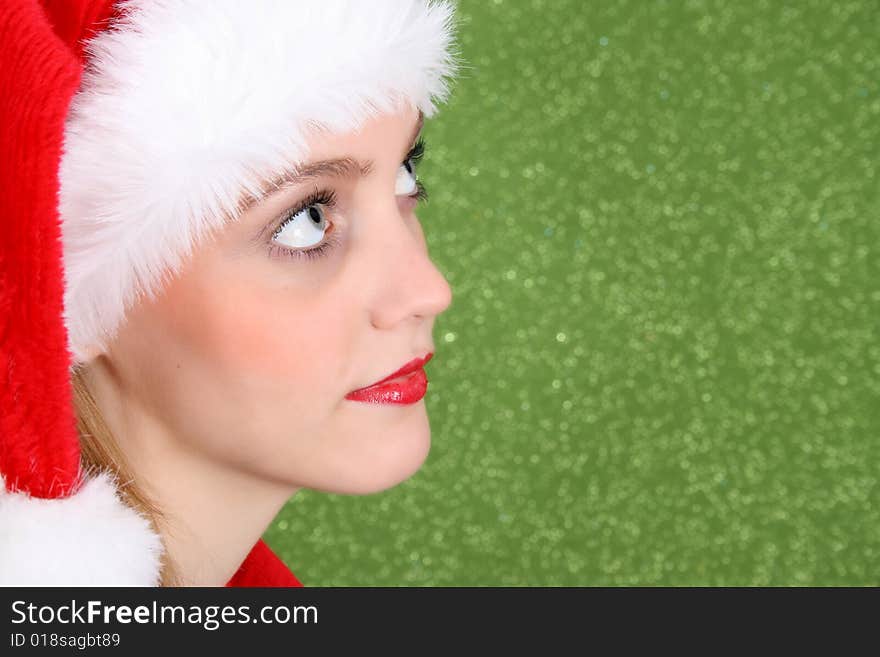 Teenager with red lips wearing a christmas hat. Teenager with red lips wearing a christmas hat