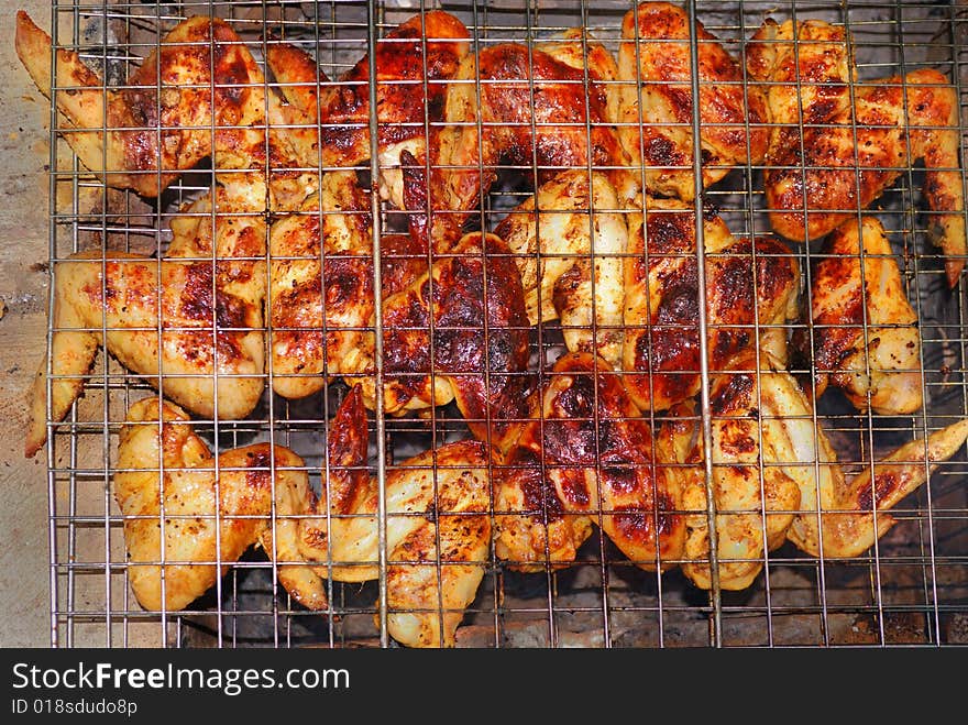 Chicken wings, baked in barbecue