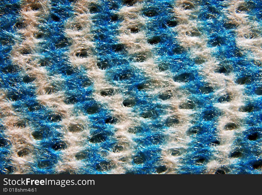 A macro shot of a blue and white cleaning cloth. A macro shot of a blue and white cleaning cloth