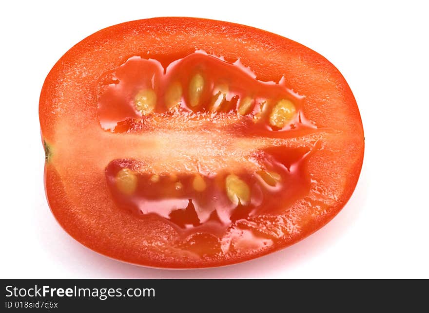 Cut cherry tomato close up.