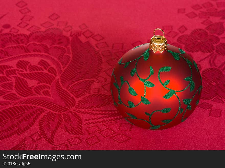 Red christmas ball, holiday background