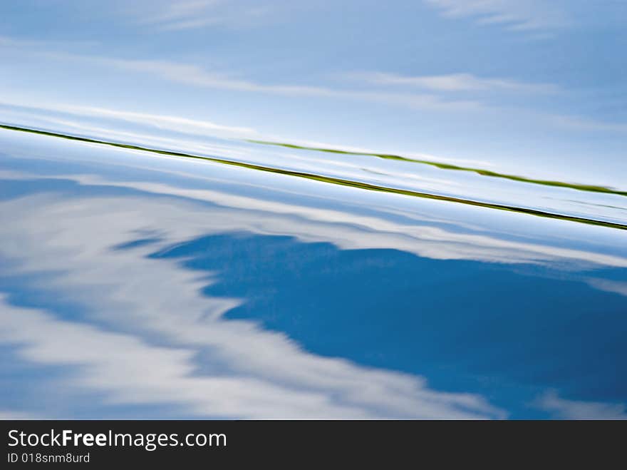 Clouds reflected on the water.