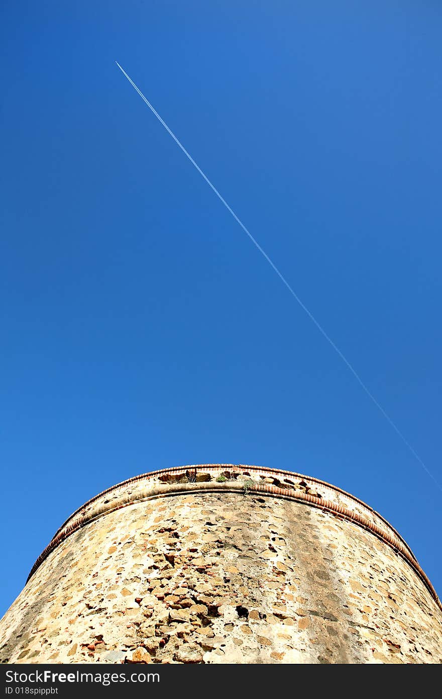 Moorish Tower Blue Sky And Aeroplane