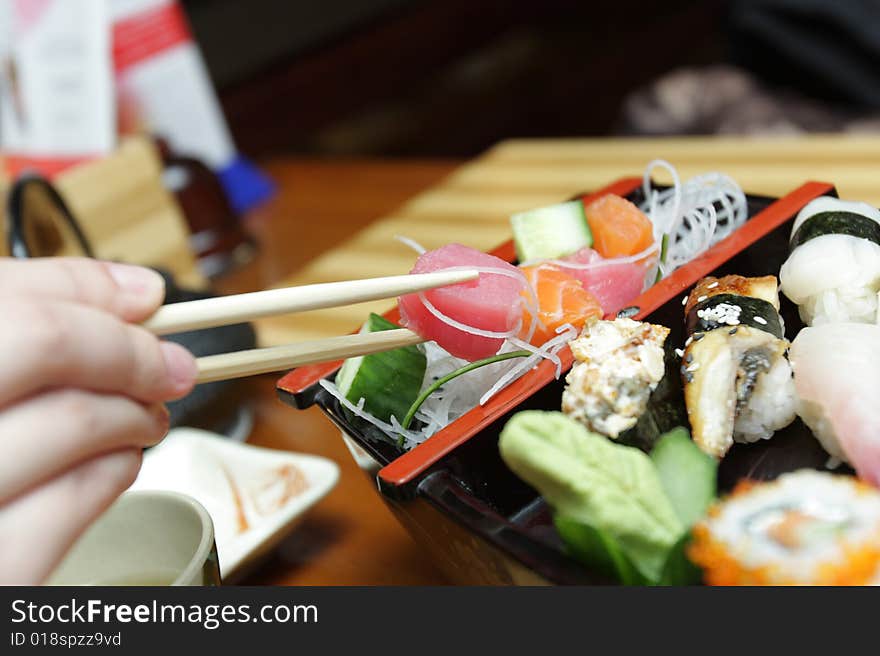 The slice of a row fish in restaurant. The slice of a row fish in restaurant