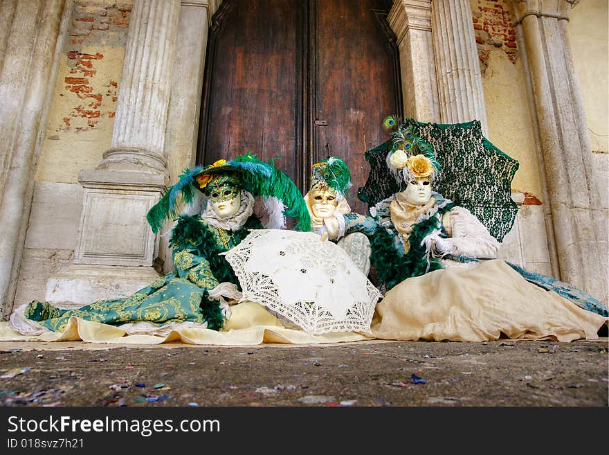 Three beautiful  masks in Venice, Italy. Three beautiful  masks in Venice, Italy.