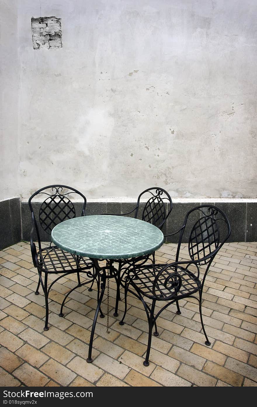Café table and three chairs in Kyiv, Ukraine.