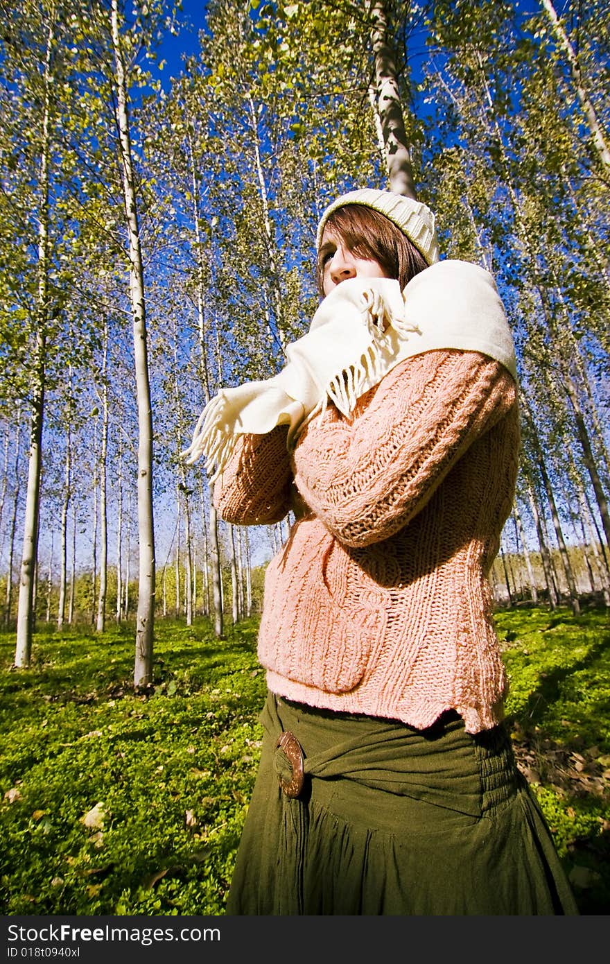 Young woman ready for a cold day in the forest. Young woman ready for a cold day in the forest