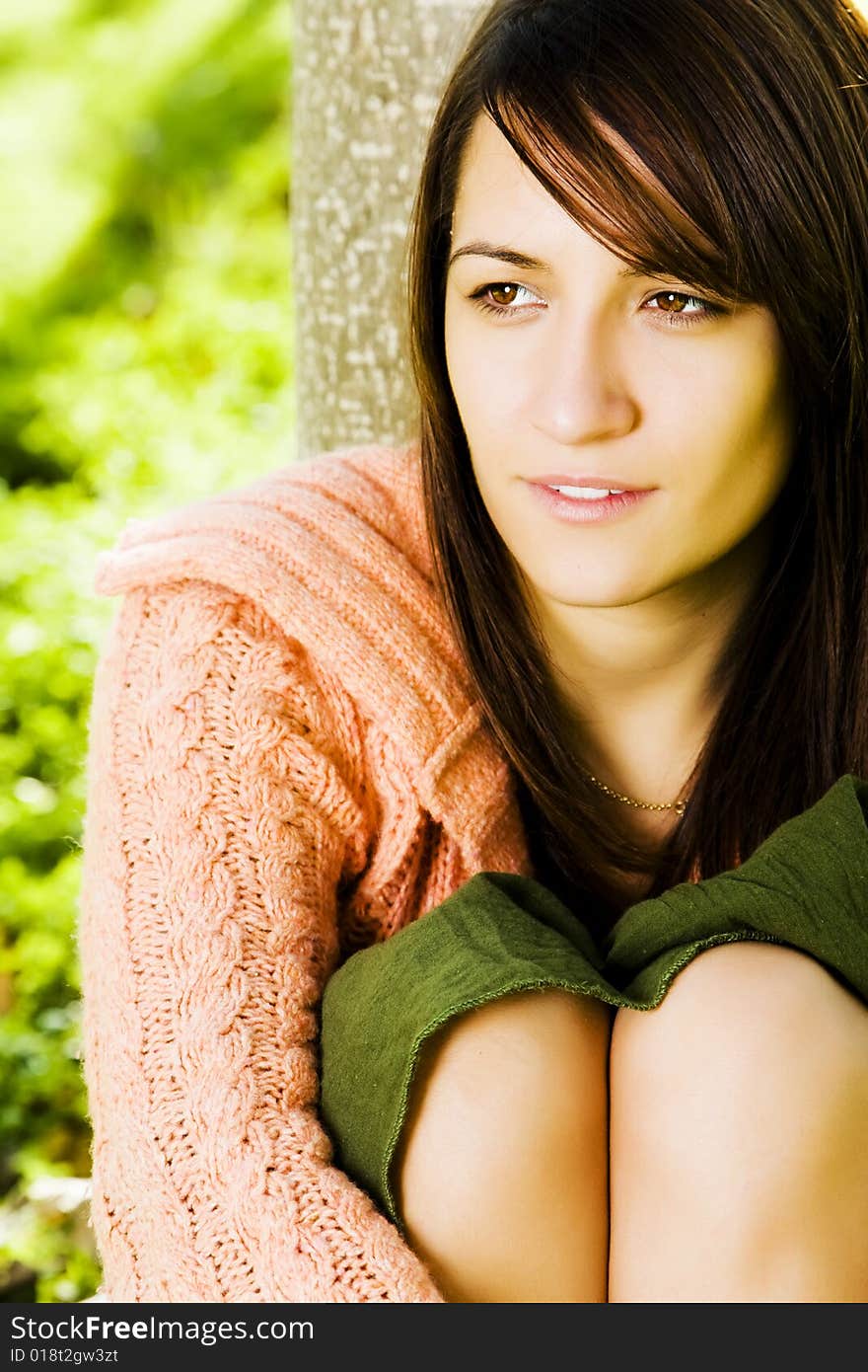 Young beautiful woman posing in a forest. Young beautiful woman posing in a forest.