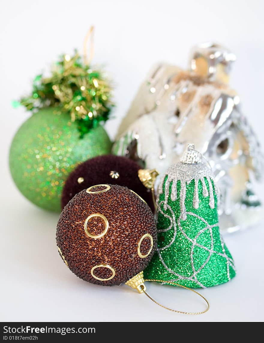 Collection of christmas tree toys on white background. Shallow depth of field