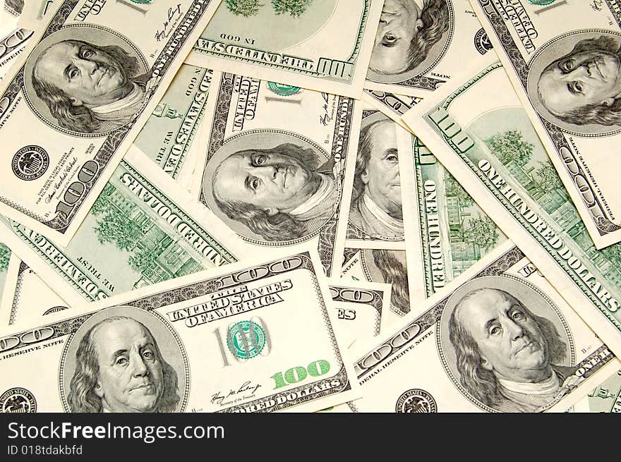 Lots of hundred dollar bills. Background image. Lots of hundred dollar bills. Background image