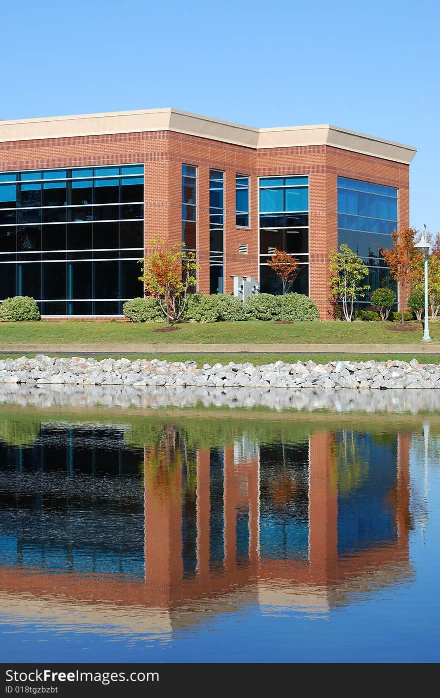 Office building with a reflection. Office building with a reflection