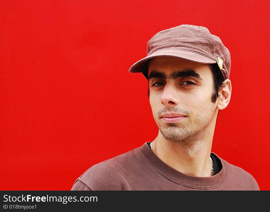 Man portrait over red background