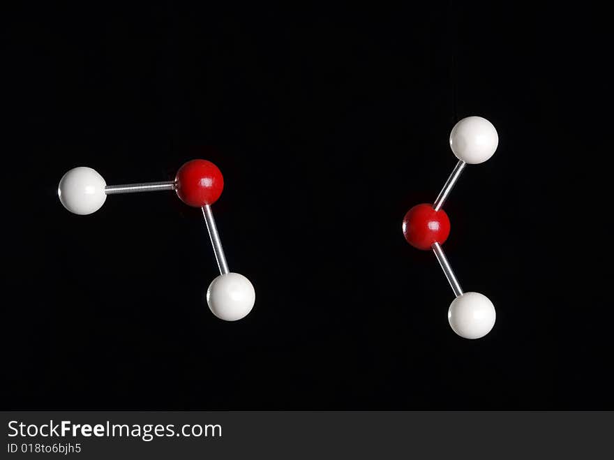 A 3 dimensional model of a water molecule. A 3 dimensional model of a water molecule.