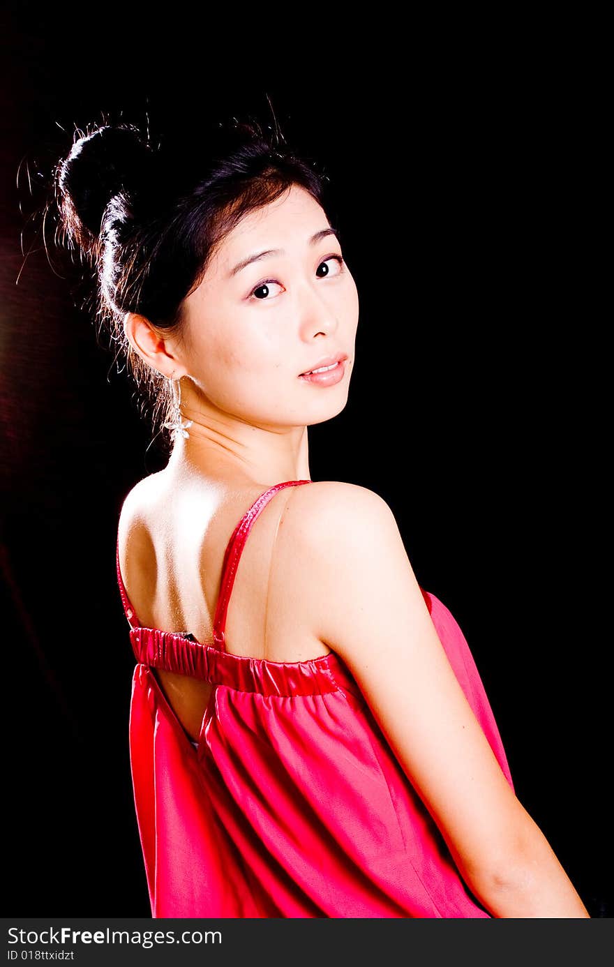 Portrait of beautiful asian female back in red. Portrait of beautiful asian female back in red