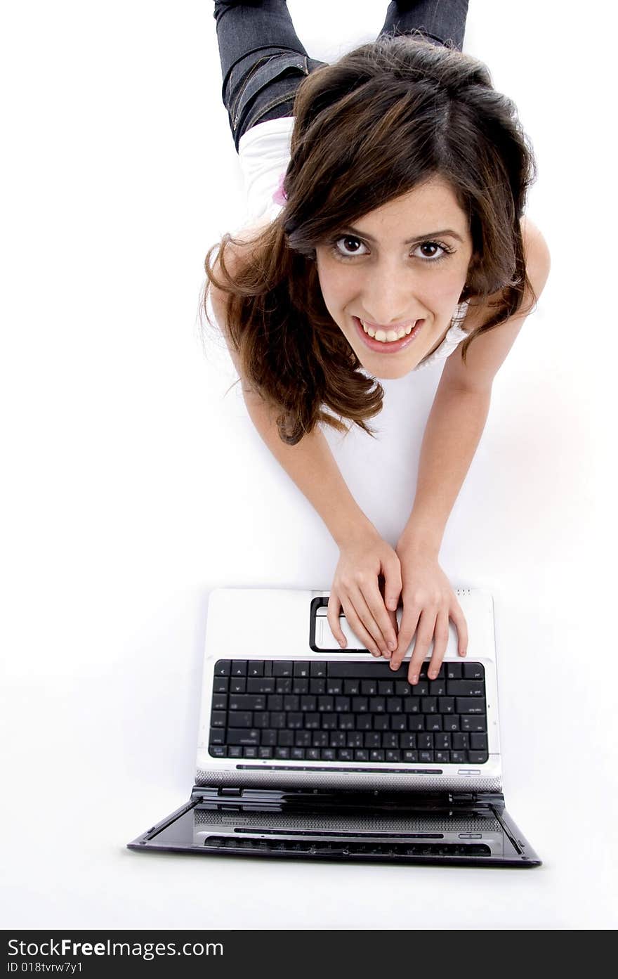 Laying woman working on laptop