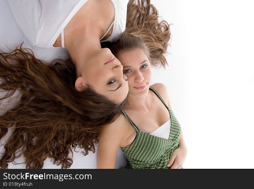 Close up view young two cute friends on an isolated white background