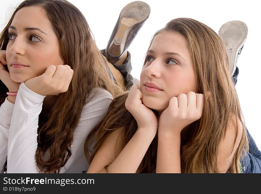 Close up view young two cute friends on an isolated white background