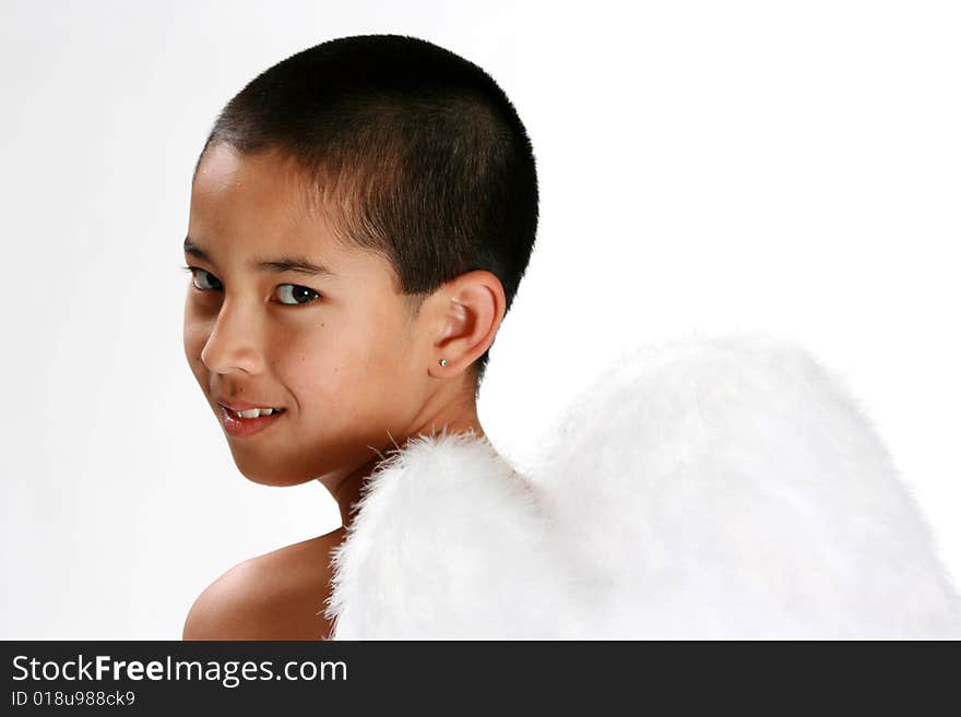 Young Asian boy with angel wings. Young Asian boy with angel wings