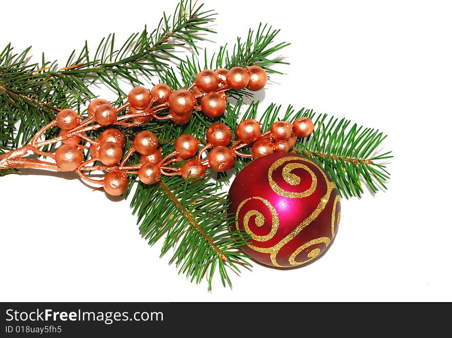 Christmas composition with gold berry, pine and red ball ornament isolated on the white.