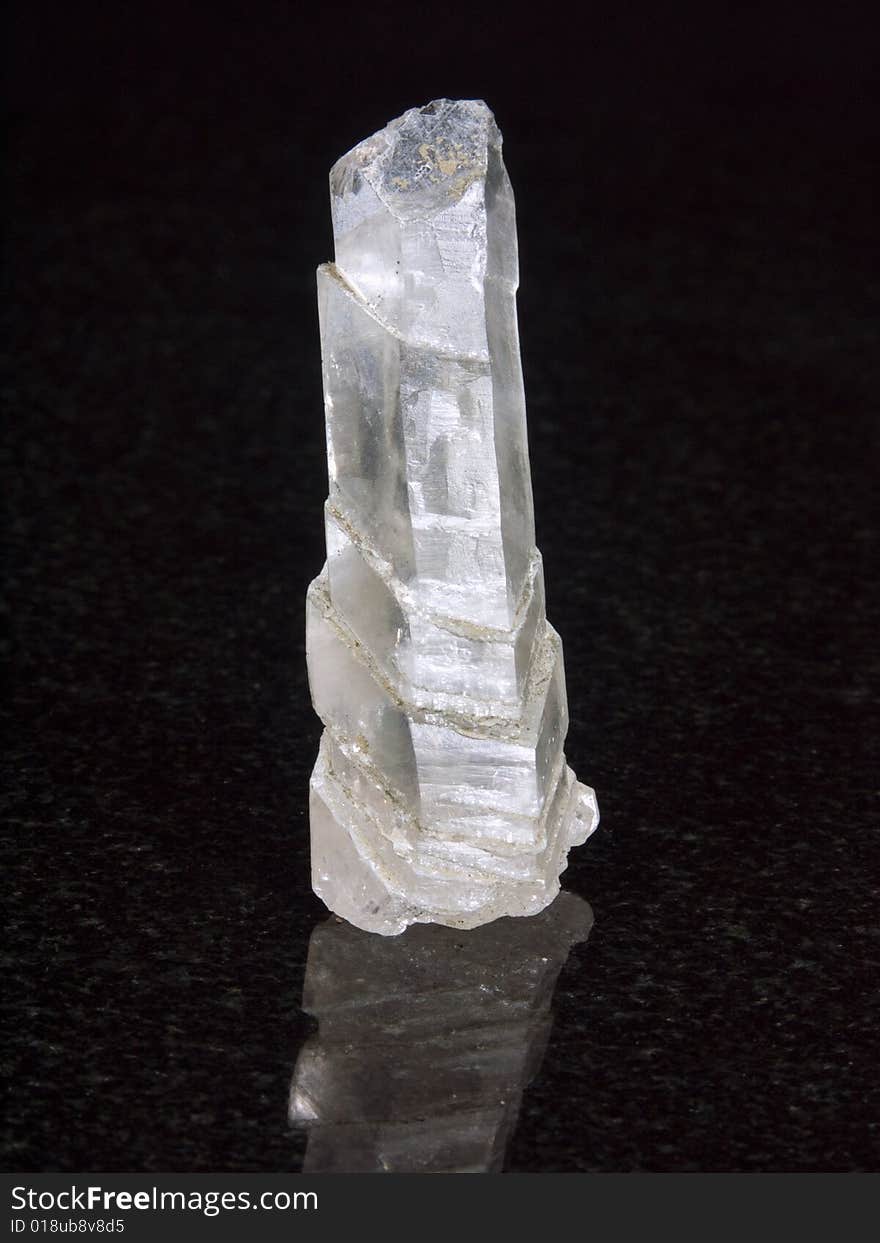 Sample rock crystal on a black background