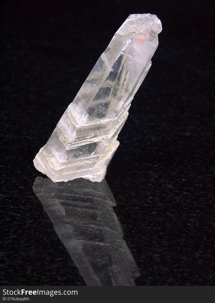 Sample rock crystal on a black background