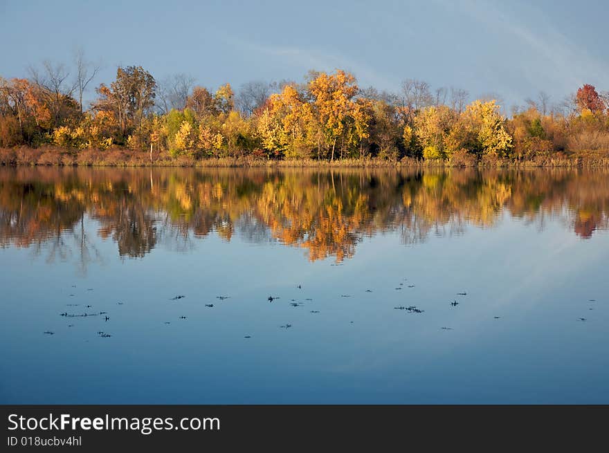 Fall colors on a calm lake