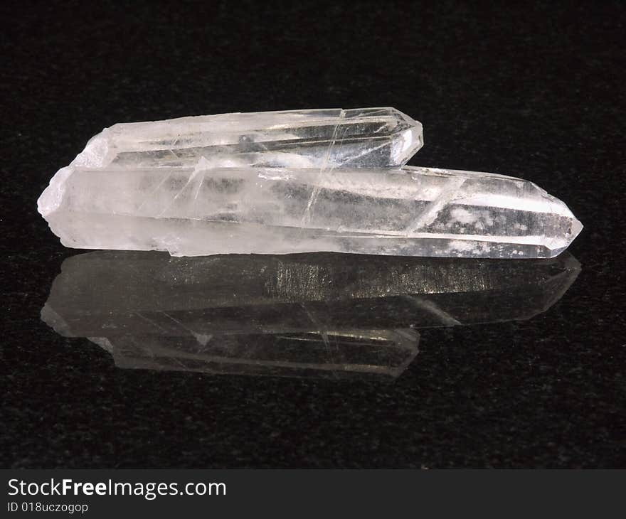 Sample rock crystal on a black background