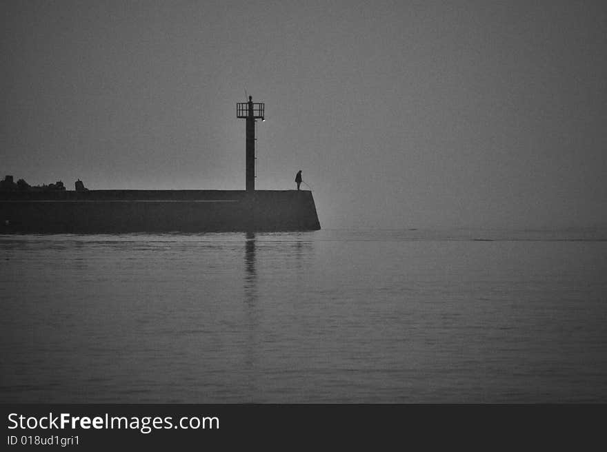 Ships entering the port during fog. Noise imitate the film and film are intentional. Ships entering the port during fog. Noise imitate the film and film are intentional.