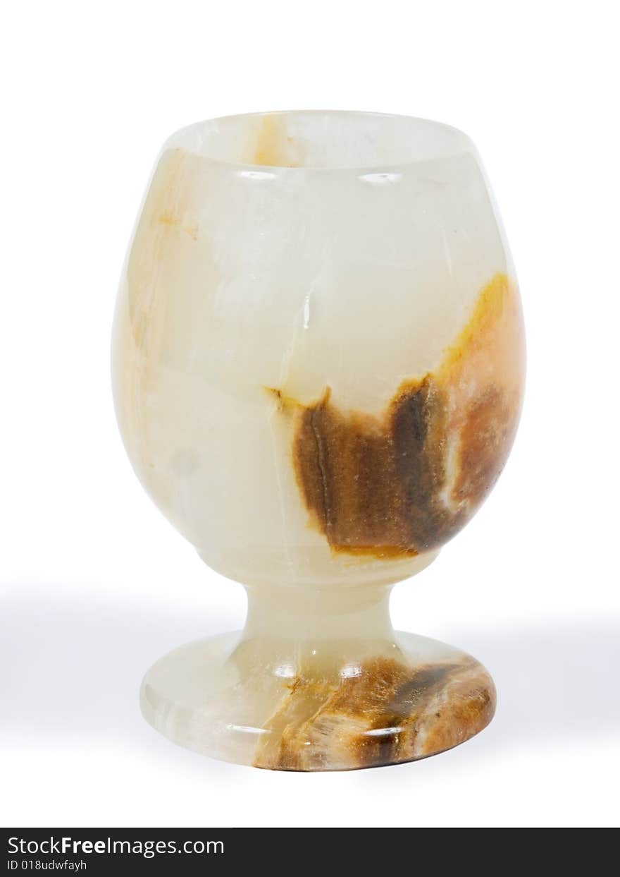 Glass from a stone on a white background