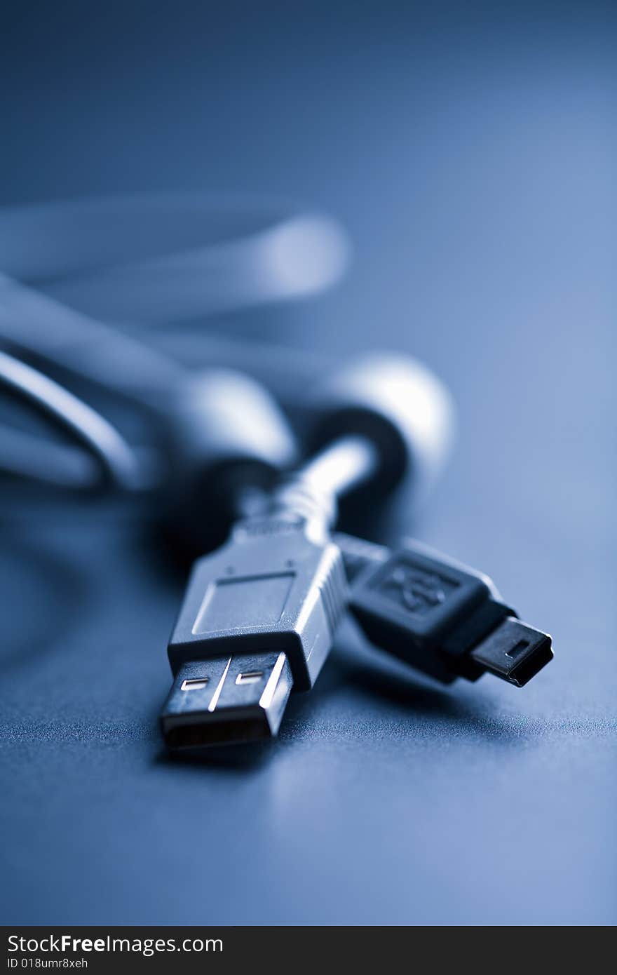 Usb cable toned blue. computer background