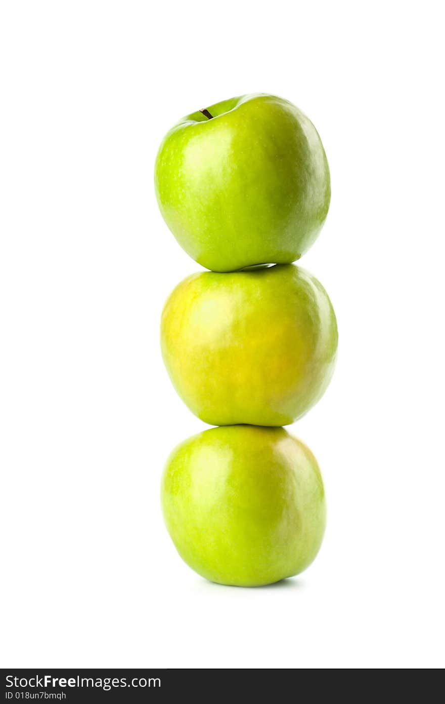 Three green apples isolated on white