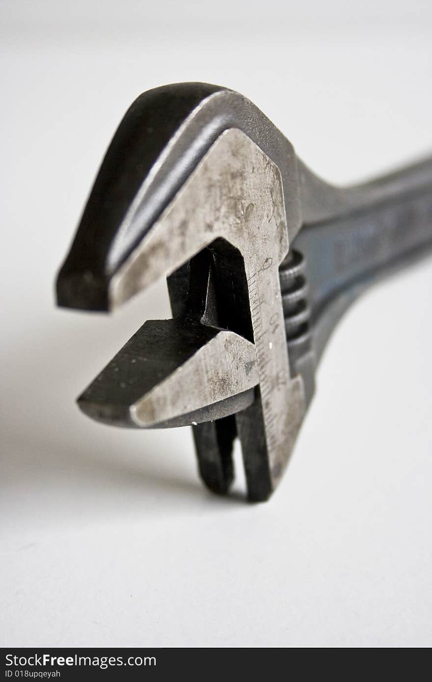 Tool : a closeup of a wrench. Tool : a closeup of a wrench