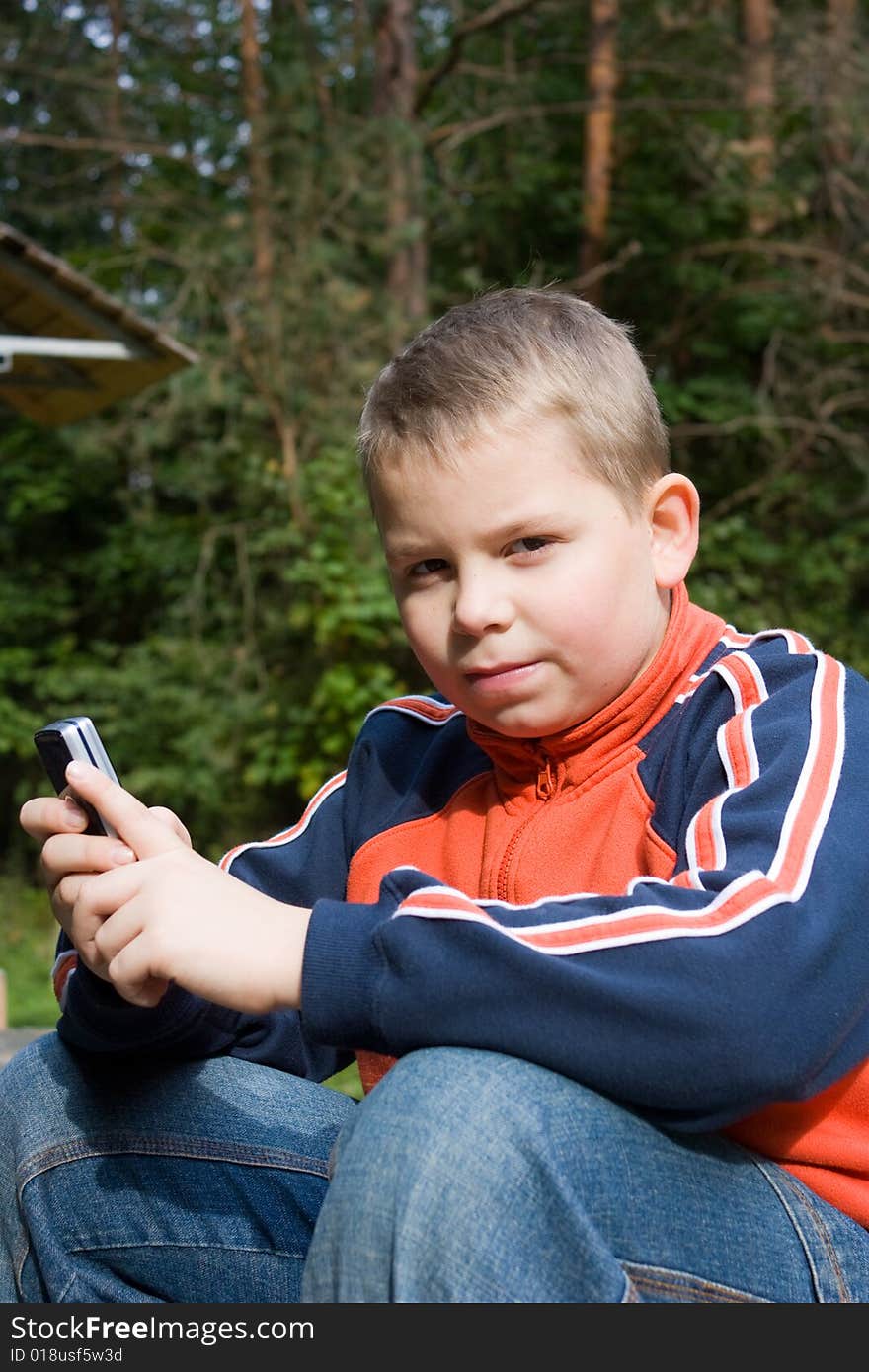 Teenager with a mobile phone, boys