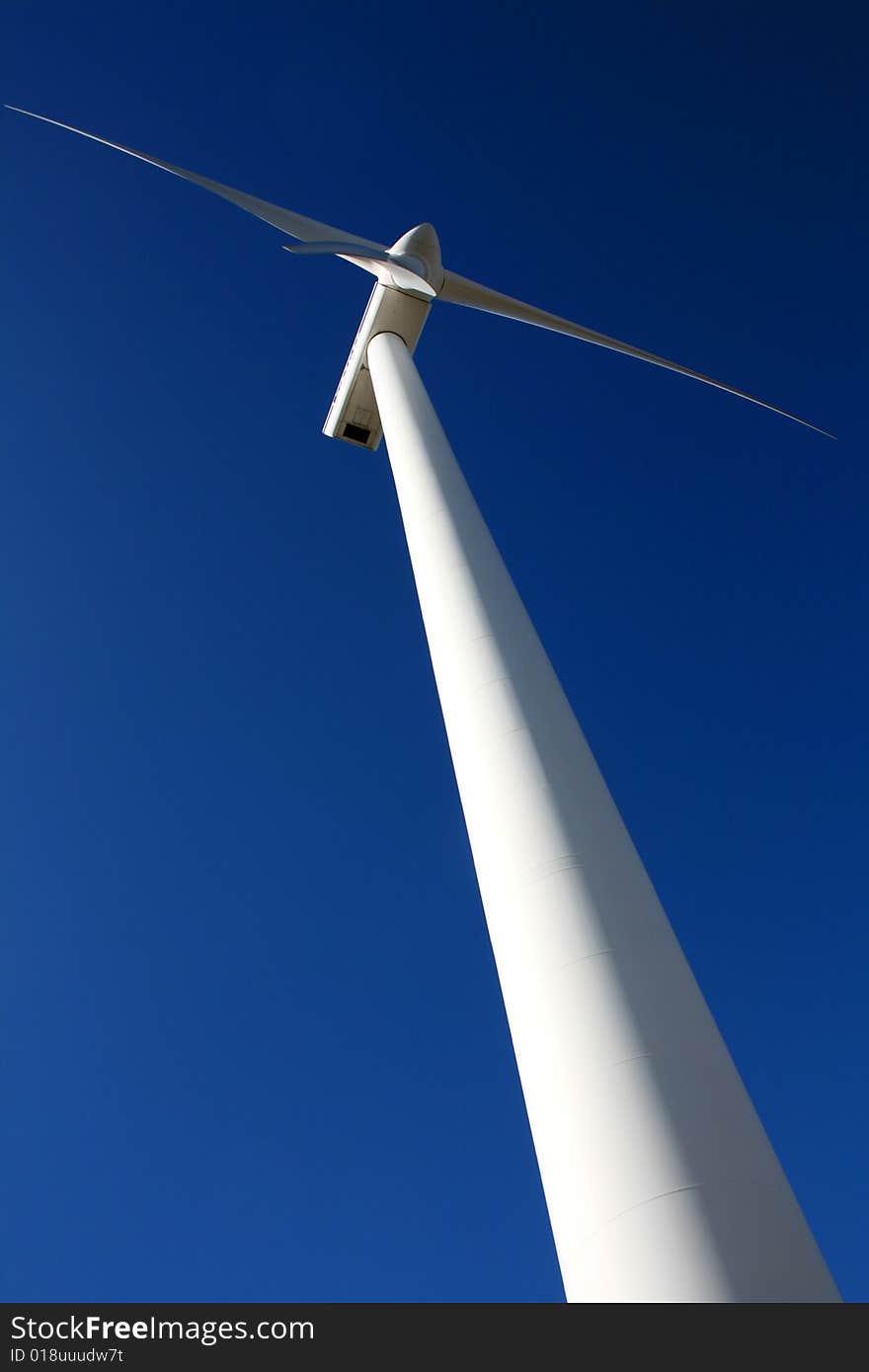 Blue sky and modern windmill