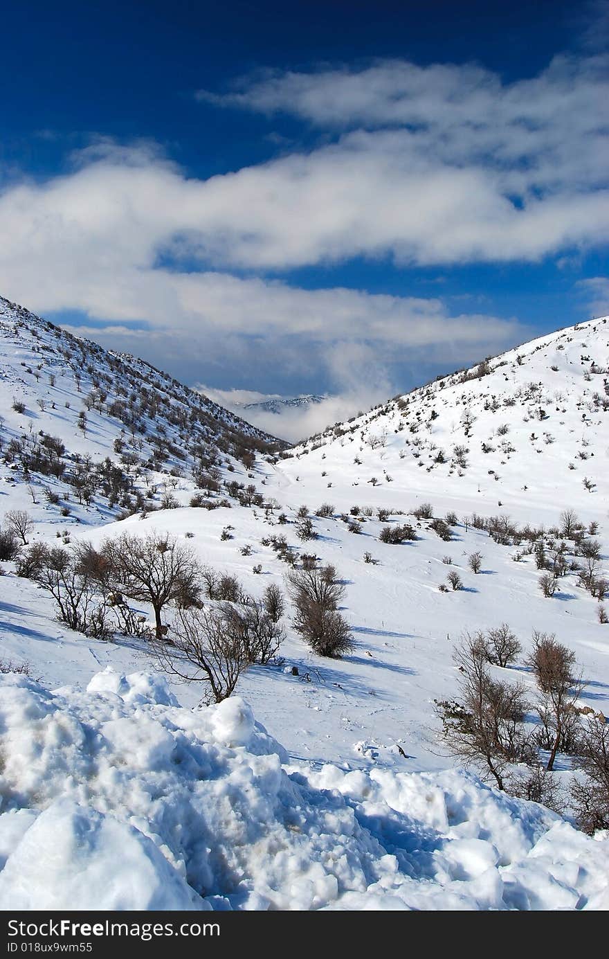 Mountains of snow in northern Israel early in the morning at the rising of the sun. Mountains of snow in northern Israel early in the morning at the rising of the sun