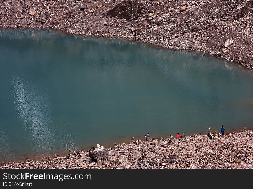 The lake is located in Yubeng village,  Shangri-La in Yunnan, China. The lake is located in Yubeng village,  Shangri-La in Yunnan, China.