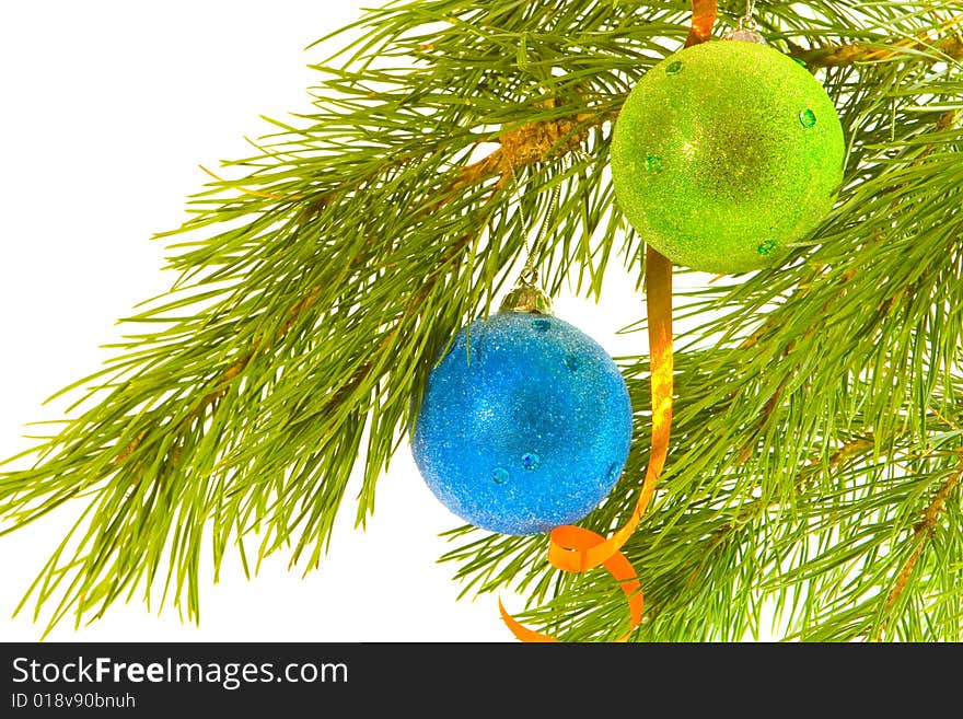 Green and blue christmas balls on fir banch. Green and blue christmas balls on fir banch