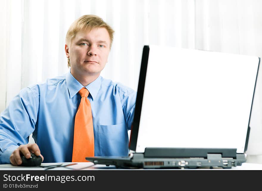 Young businessman work on laptop. Young businessman work on laptop