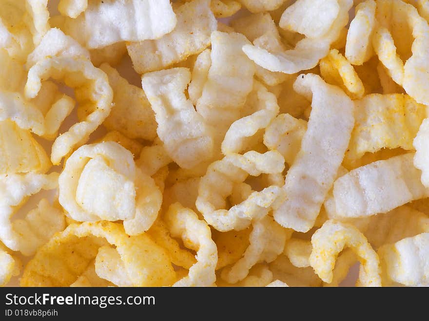 Crisp potato chips on a light background