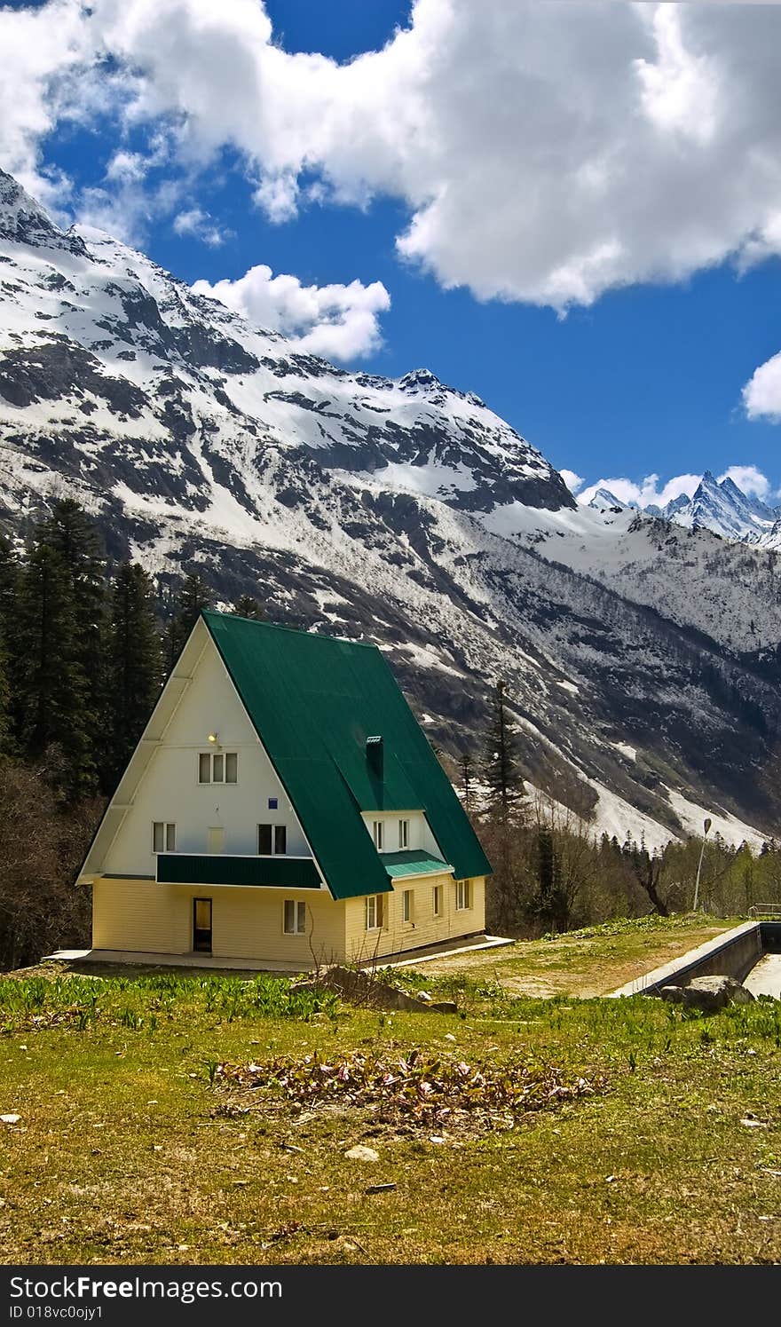 Abstract house in the mountains landscape