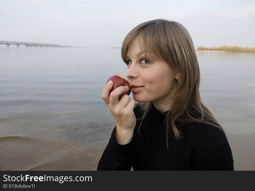 beautiful girl with an apple