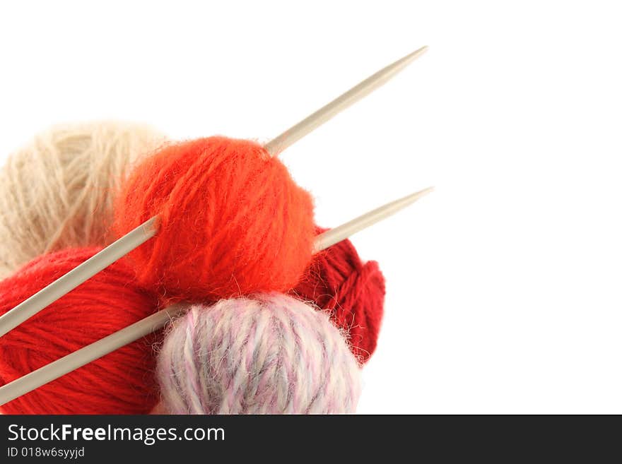 The balls of a wool yarn isolated on a white background. The balls of a wool yarn isolated on a white background